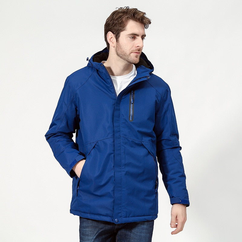DEFROST - Heated Jacket in blue worn by a man