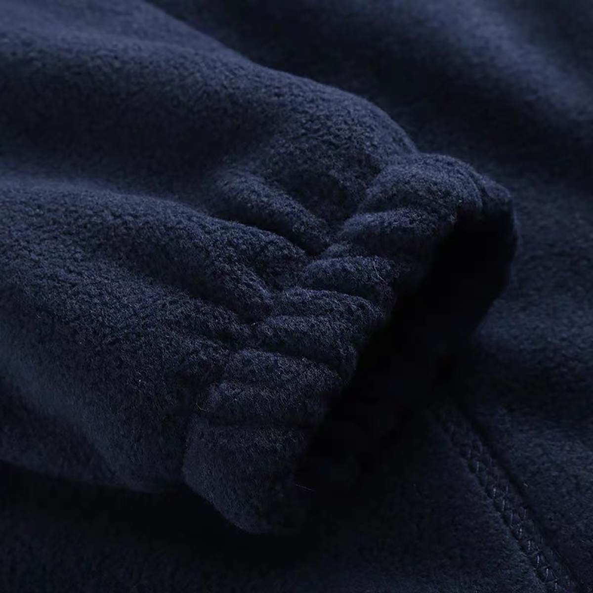 GLACIER Jacket - Heated fleece in blue with detailed sleeve